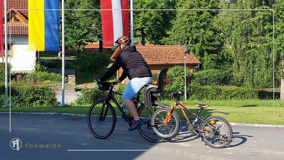 dank foaweida mit einem Fahrrad ein Fahrrad transportieren